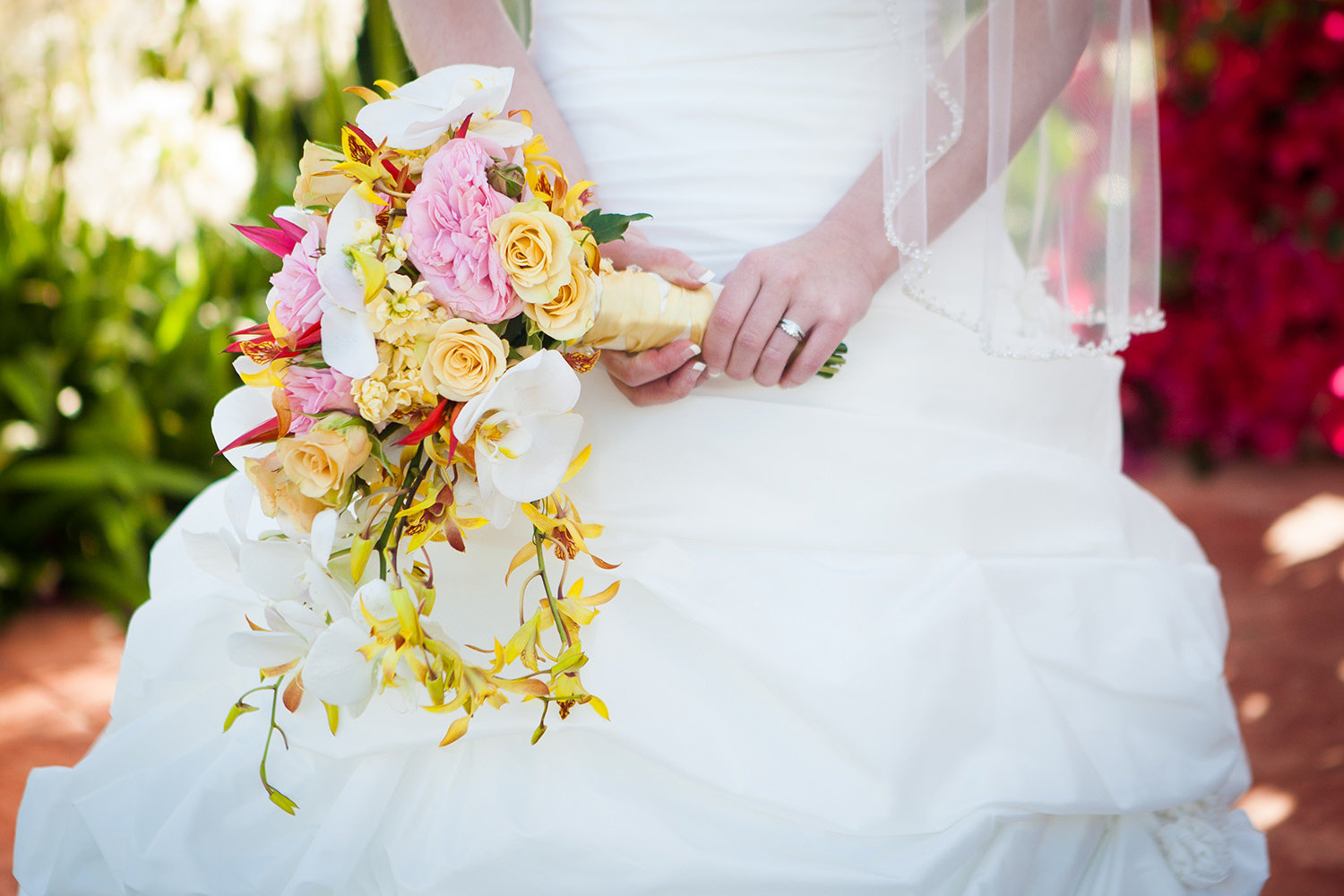 stunning bridal bouquet with yellow pink and white flowers
