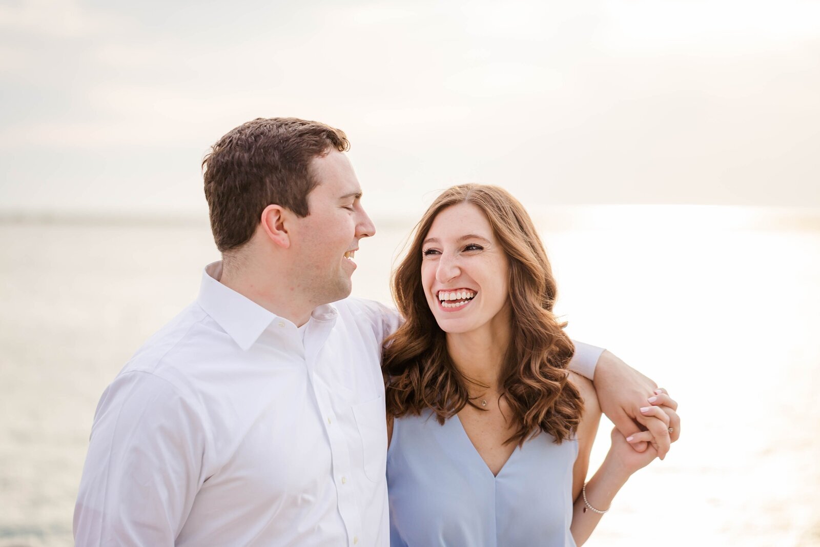 Joyful couple laughing at Erin Thompson Photography