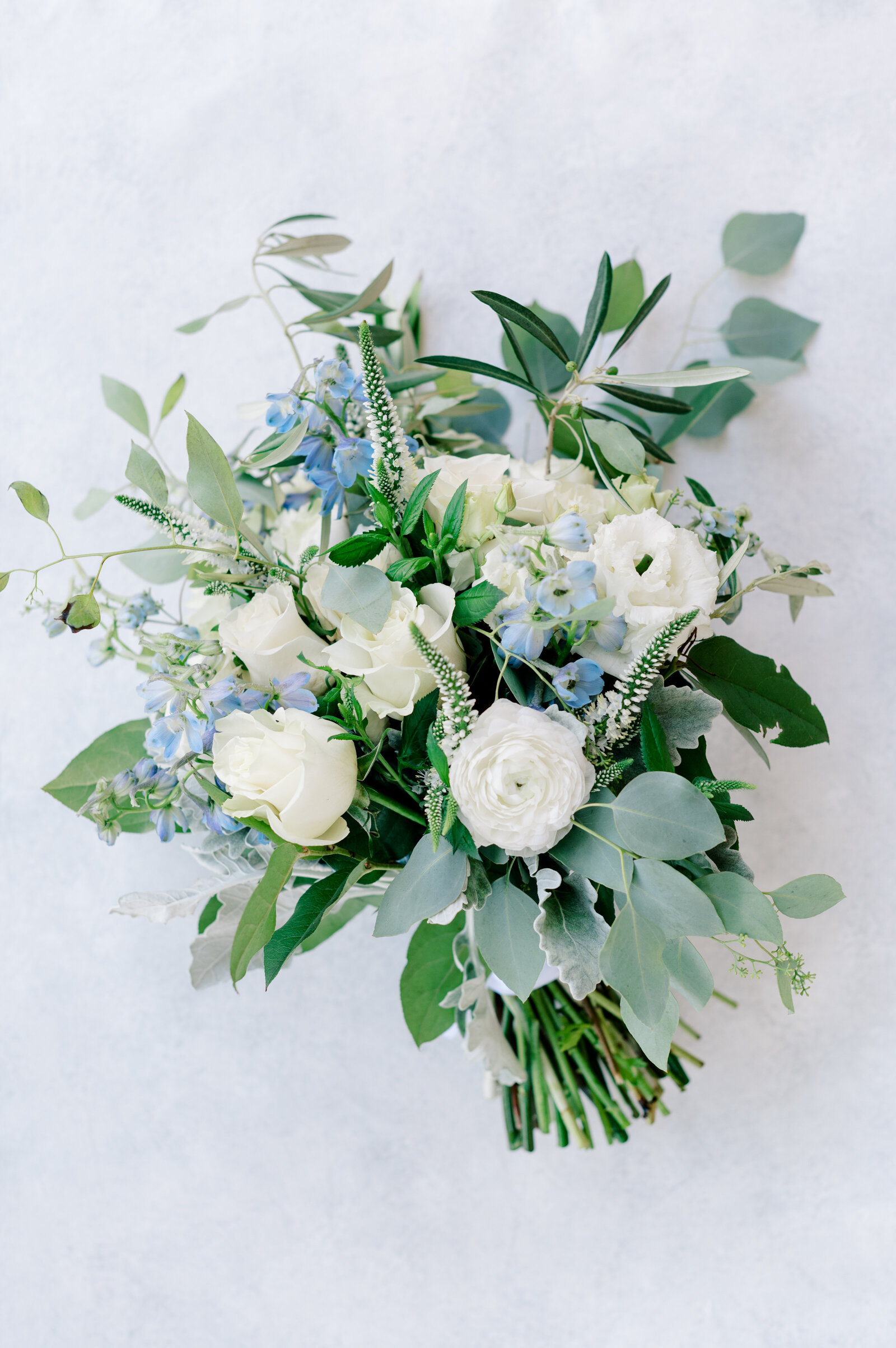 Blue and white wedding bouquet taken by the Best Boise Wedding Photographers