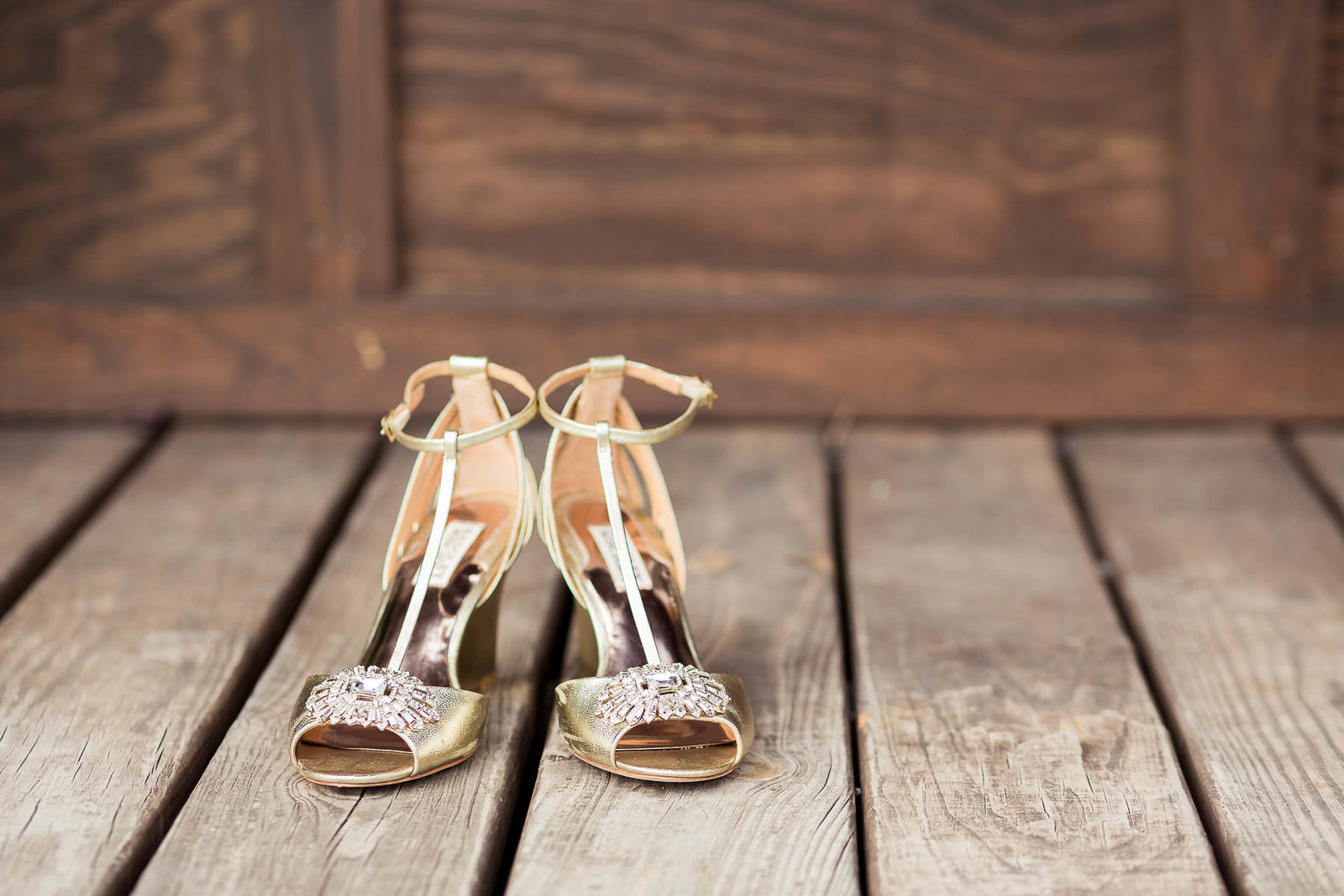Bride's shoes sit on wooden floor, Boals Farm, Charleston, South Carolina