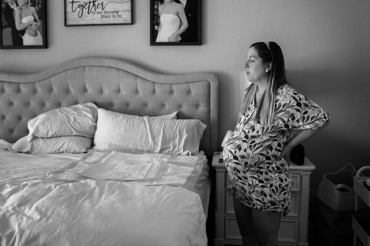 mother waits between contractions at home
