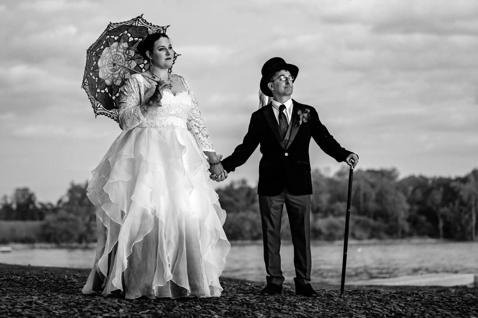 black and white portrait of couple overlooking lake