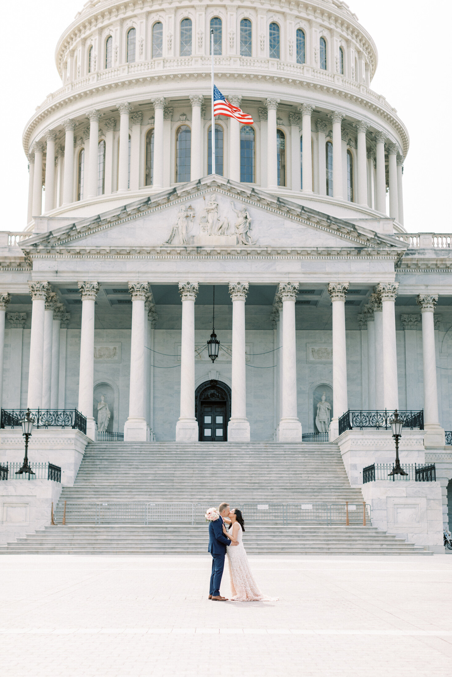 Couple kiss in front of the Supreme Court in DC