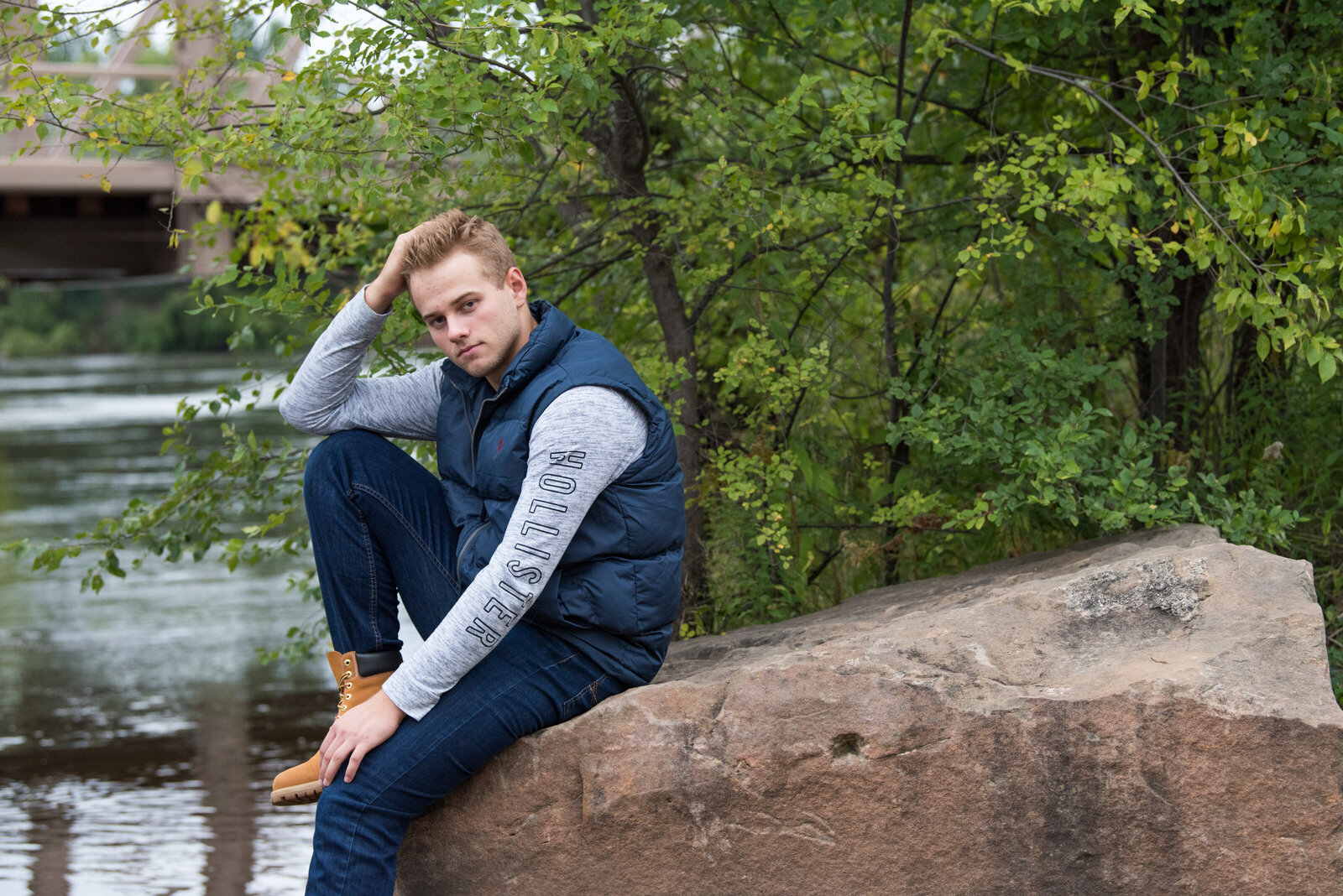 Arden Hills Minnesota high school senior boy wearing casual outfit in nature