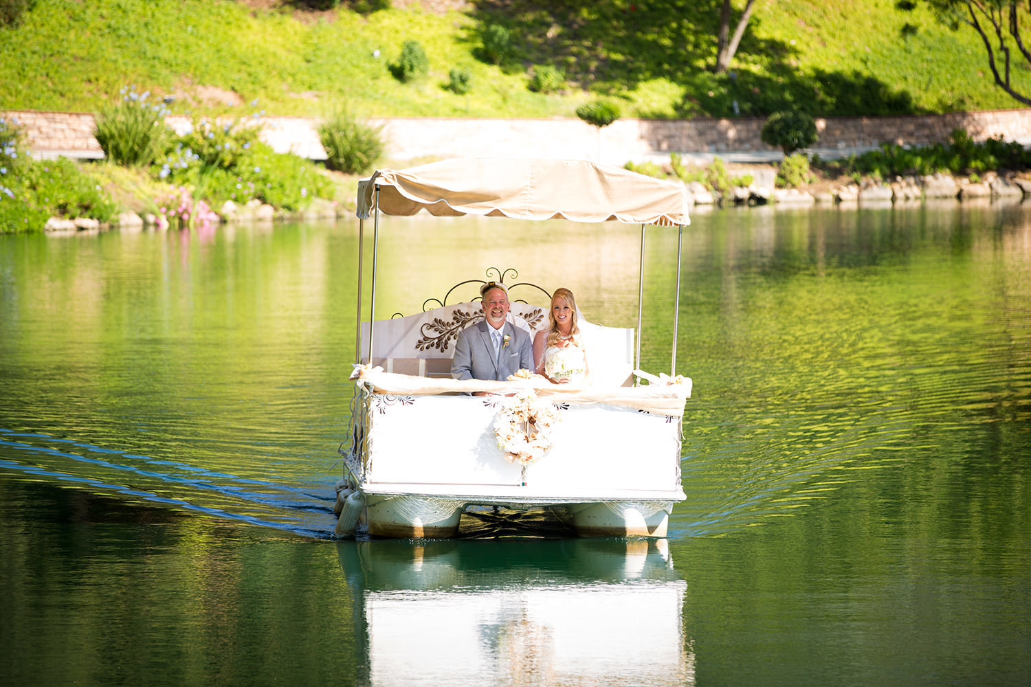 bride and groom on boat at los willows