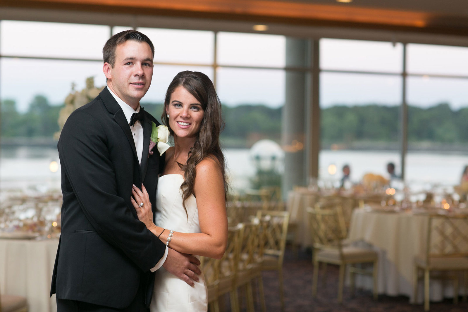 bride and groom standing in the ballroom at Glen Island Harbor Club