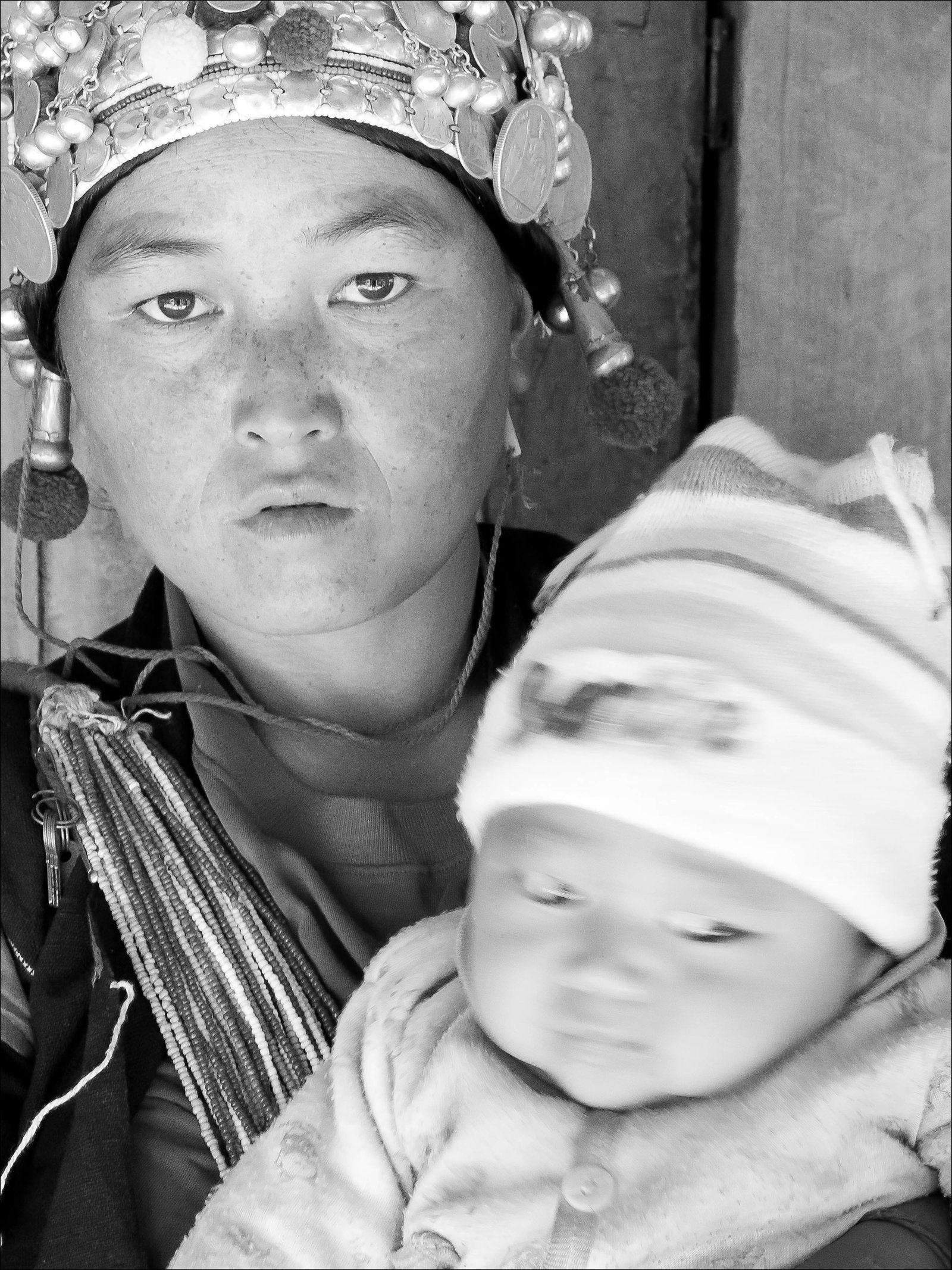 Lao mother and child in traditional garb