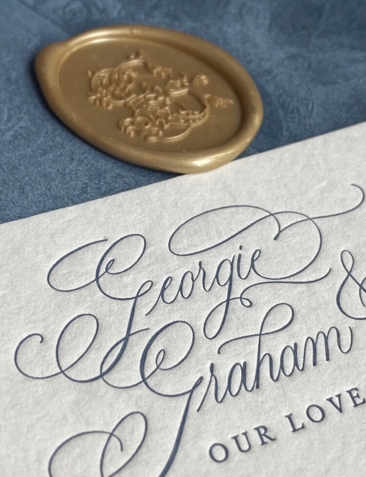 Wedding invitation with calligraphy and wax seal