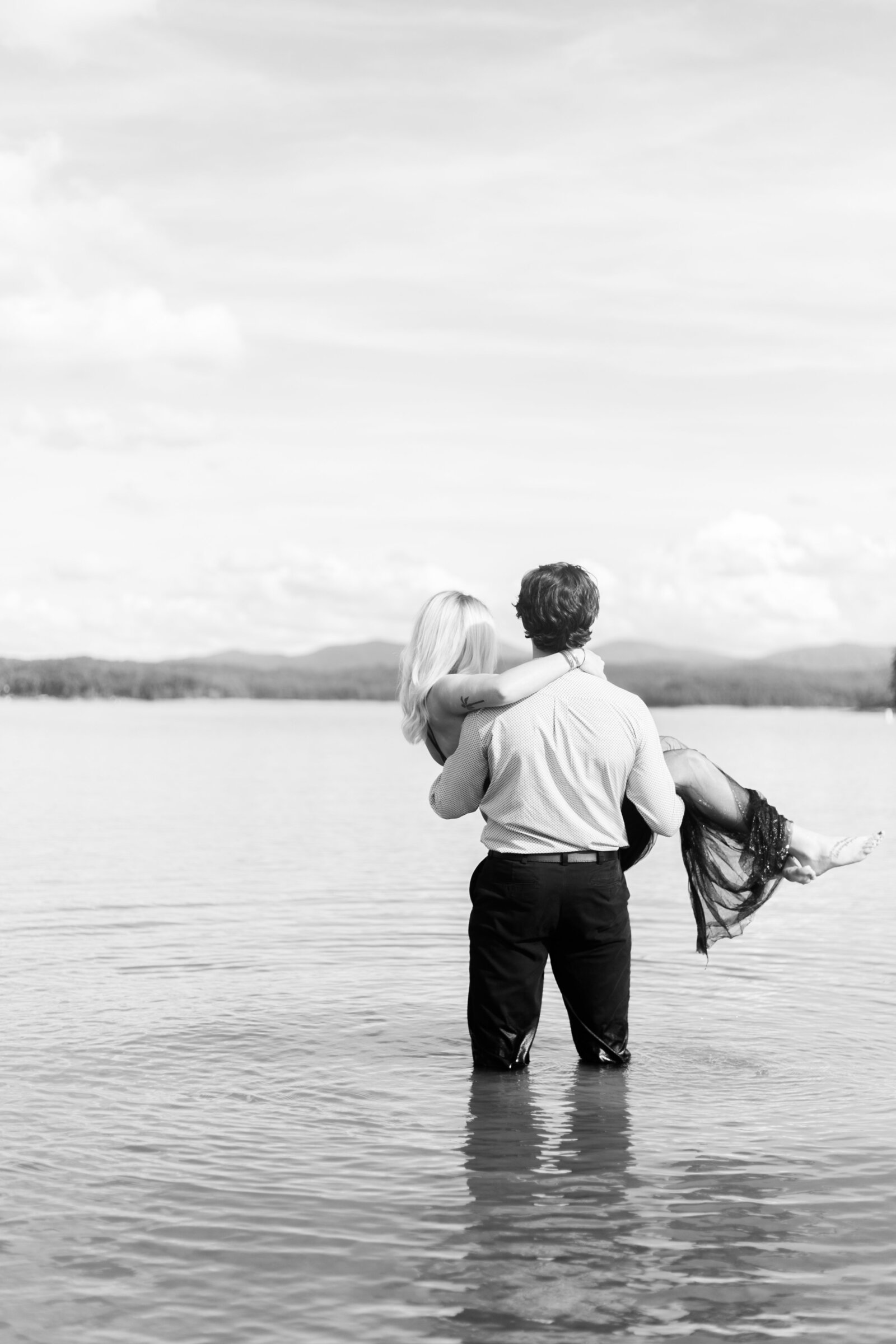 Couple with a beautiful view captured by Staci Addison Photography