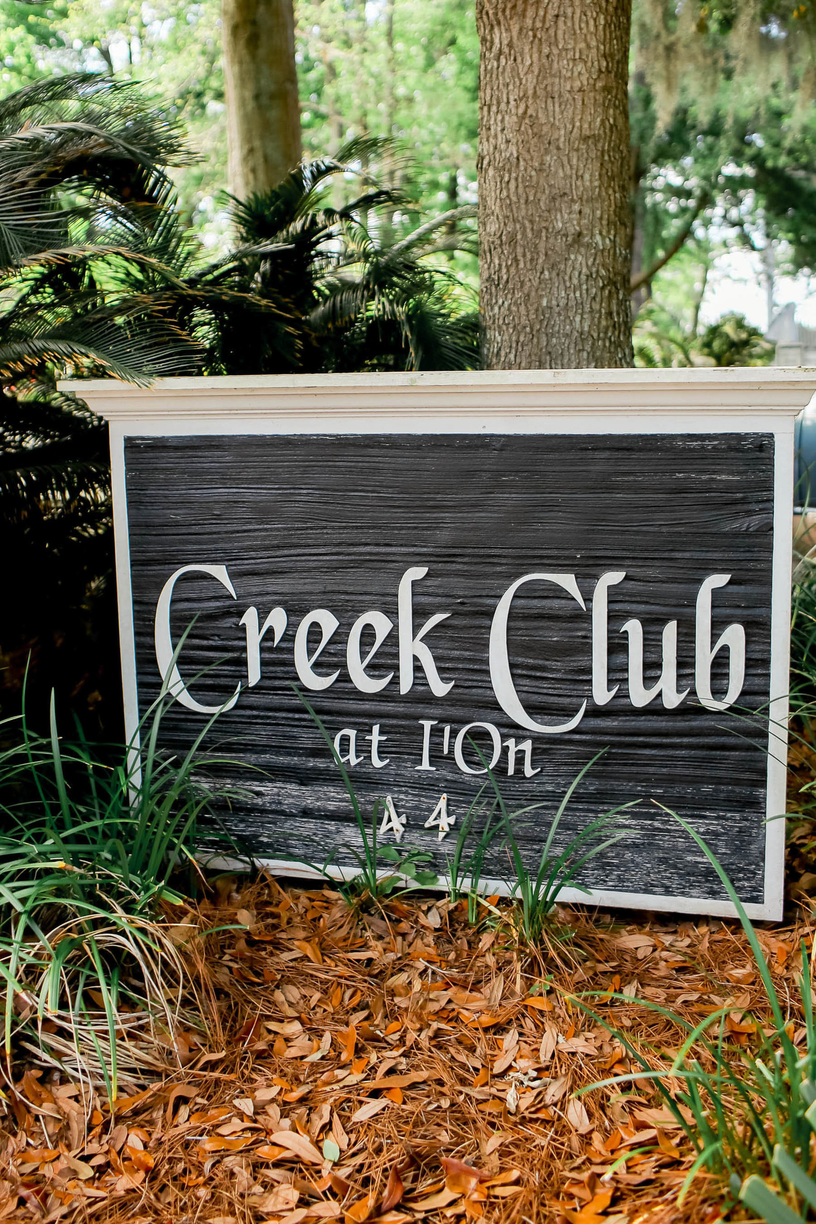 Wooden sign is displayed of I'ON Creek Club, Mt Pleasant, South Carolina
