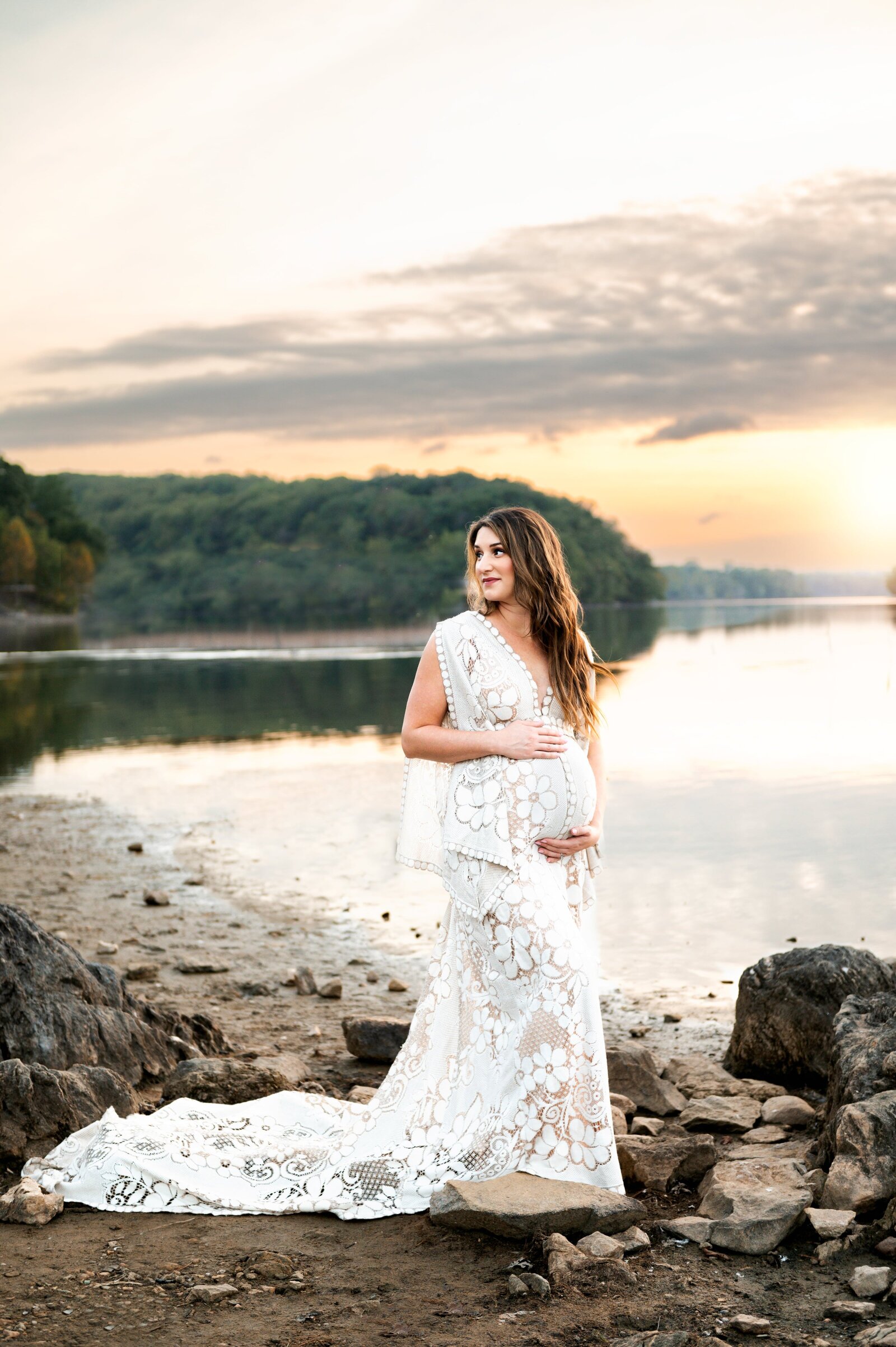 prenant woman at Loch Raven Reservior during a sunset maternity photoshoot