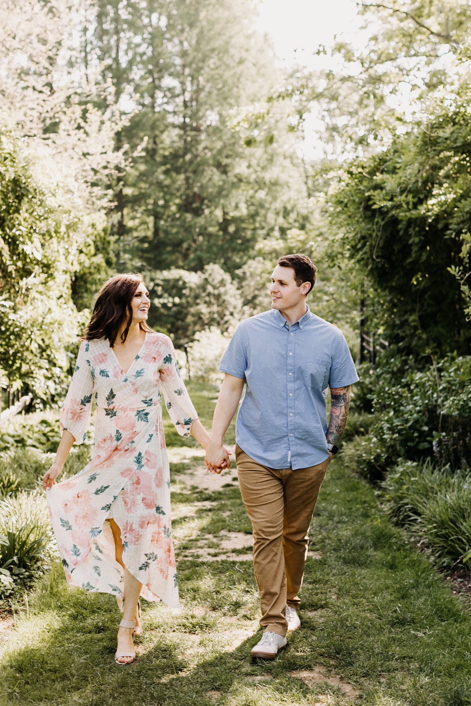 engaged couple garden flowers