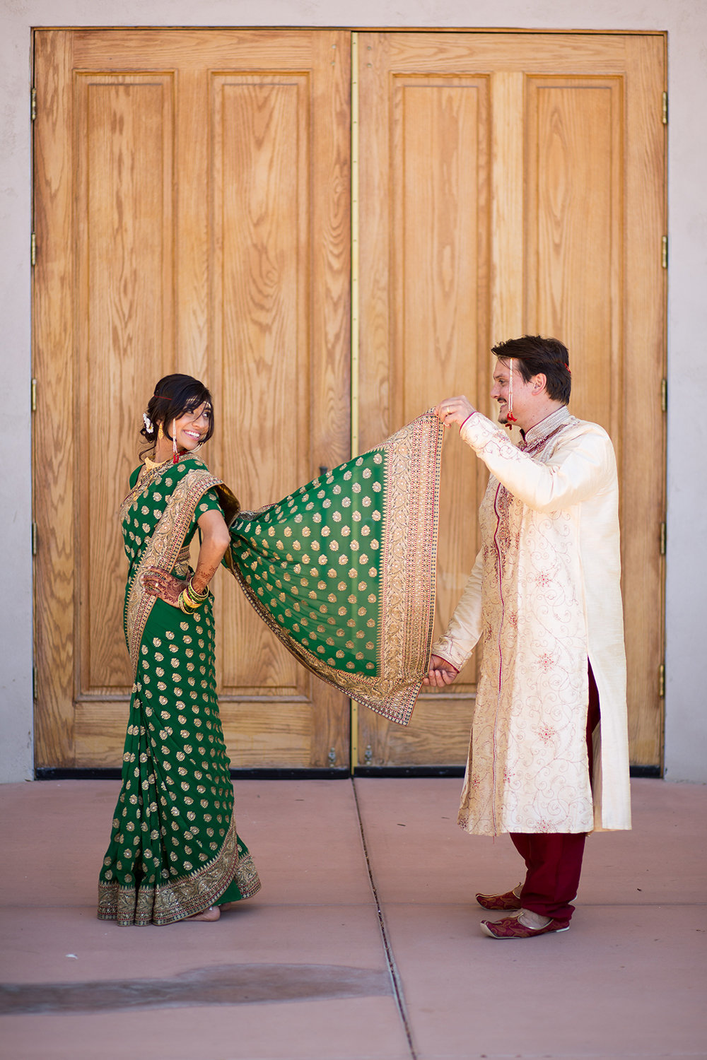 Fun pose for a an Indian bride in a Sari