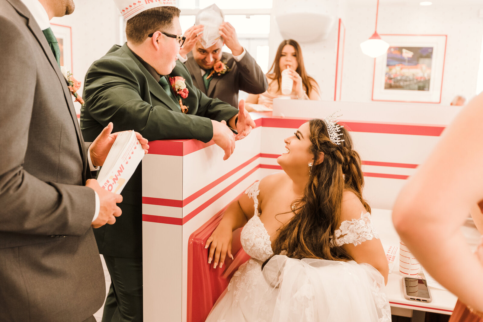 Newlyweds and bridal party stop at in n out for a burger