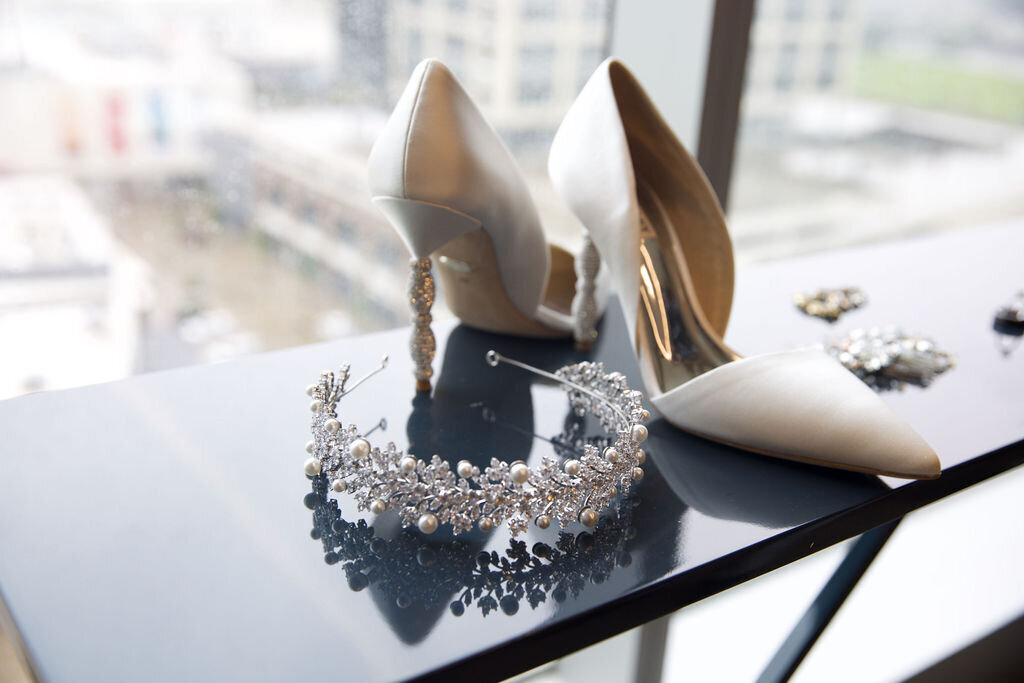 bridal accessories pearl and diamond wedding tiara and white high heeled shoes