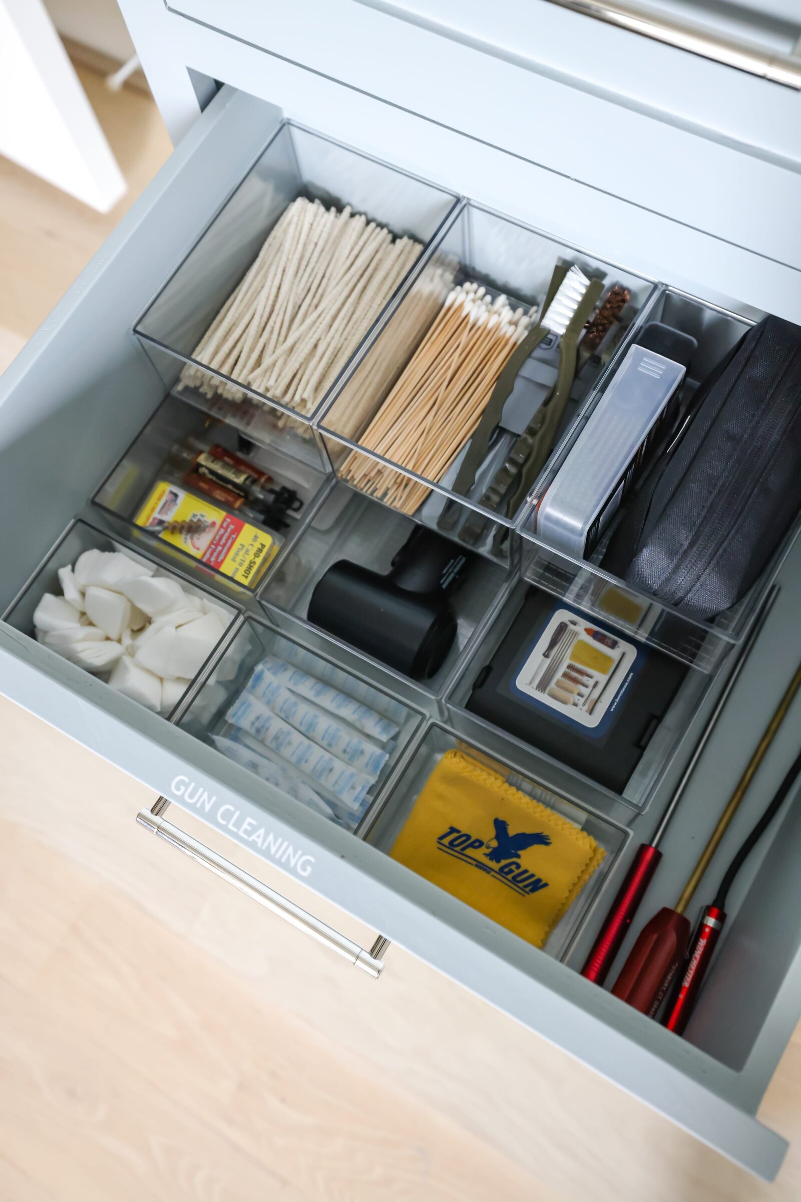 vision and hammer organizing gun cleaning drawer
