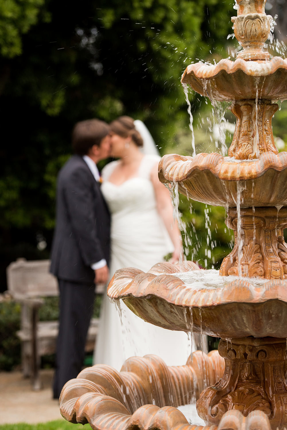 fountain with bride and groom