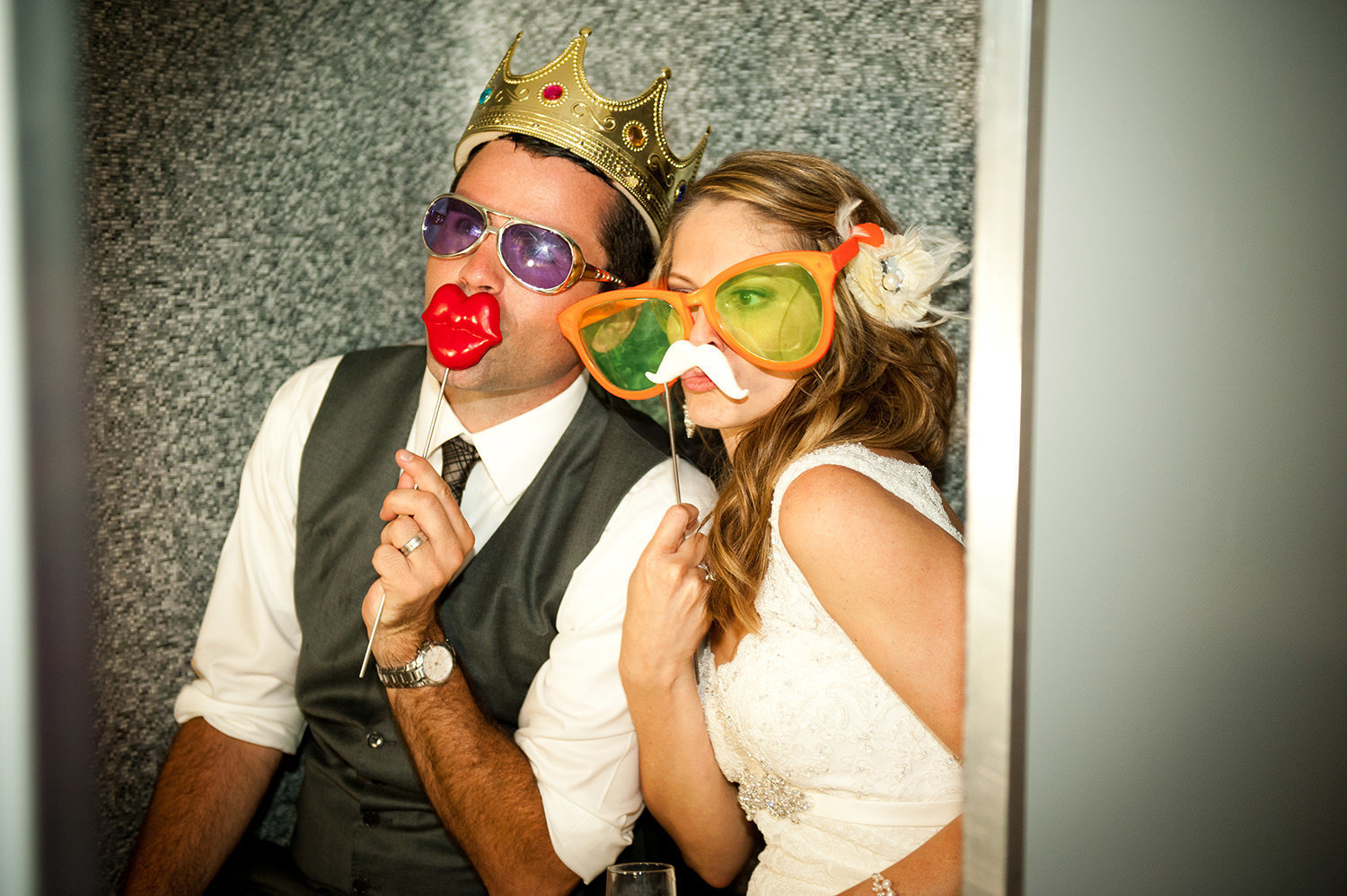 bride and groom in photo booth at hilton mission bay