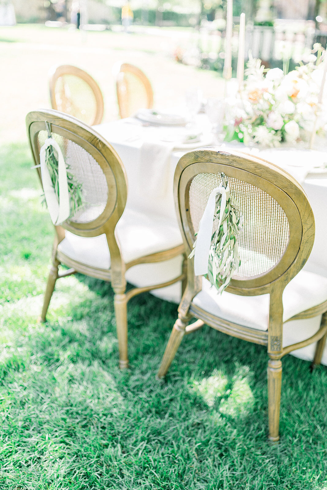 Wedding reception chairs with eucalyptus at Filoli in Woodside, CA