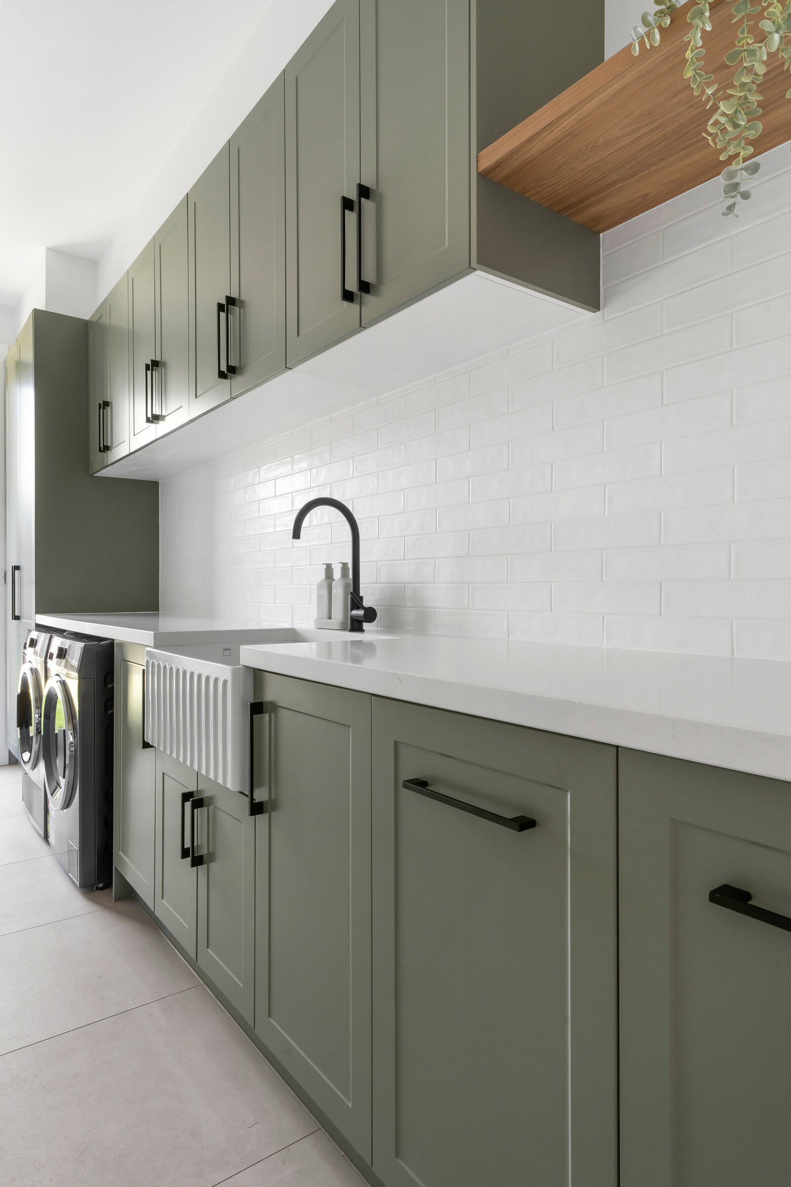 Finished laundry benchtop and cabinetry by AR Construction in Warrnambool