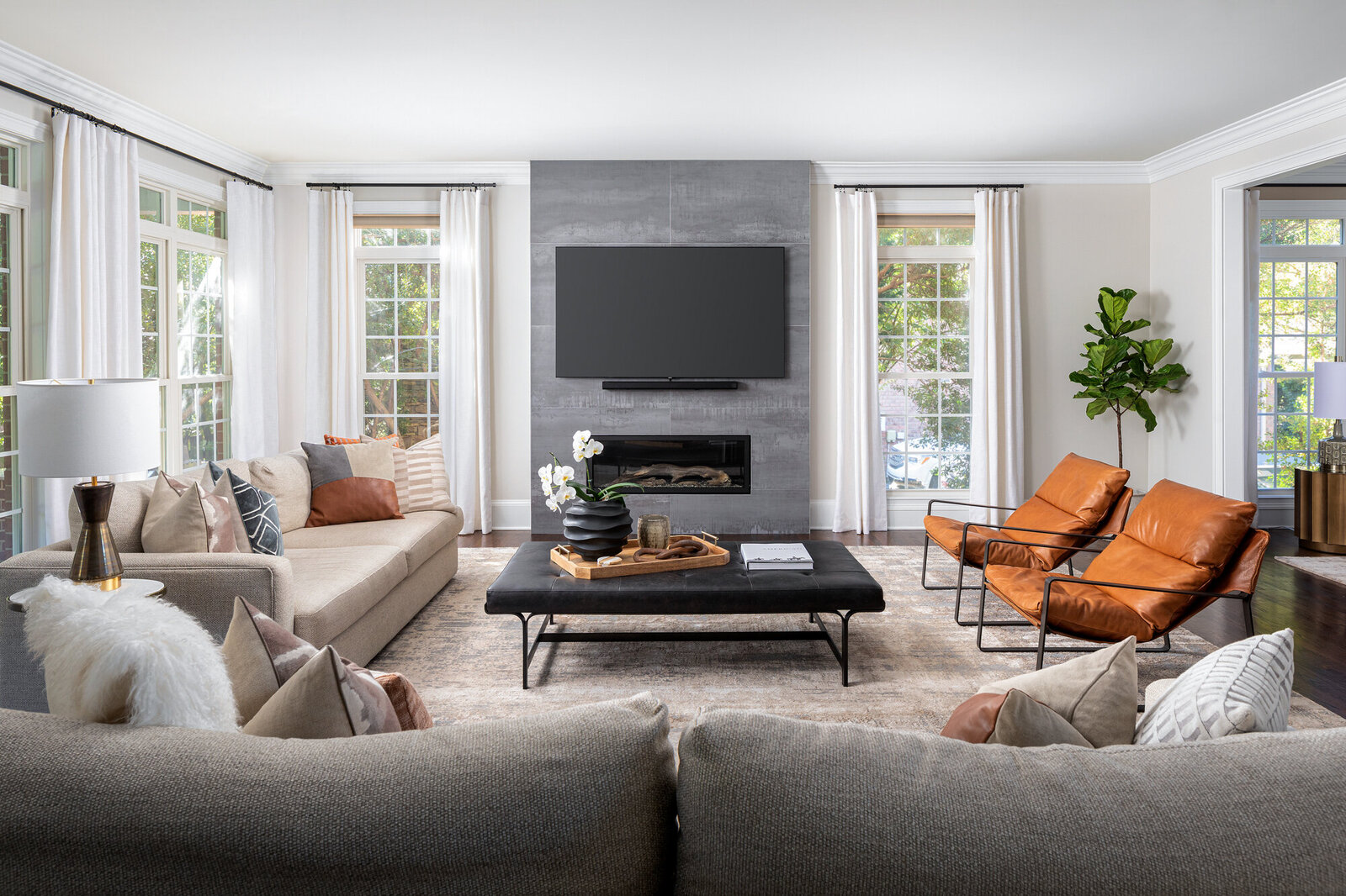 Transitional living room in a beautiful Waxhaw home. Design by Gracious Home Interiors.