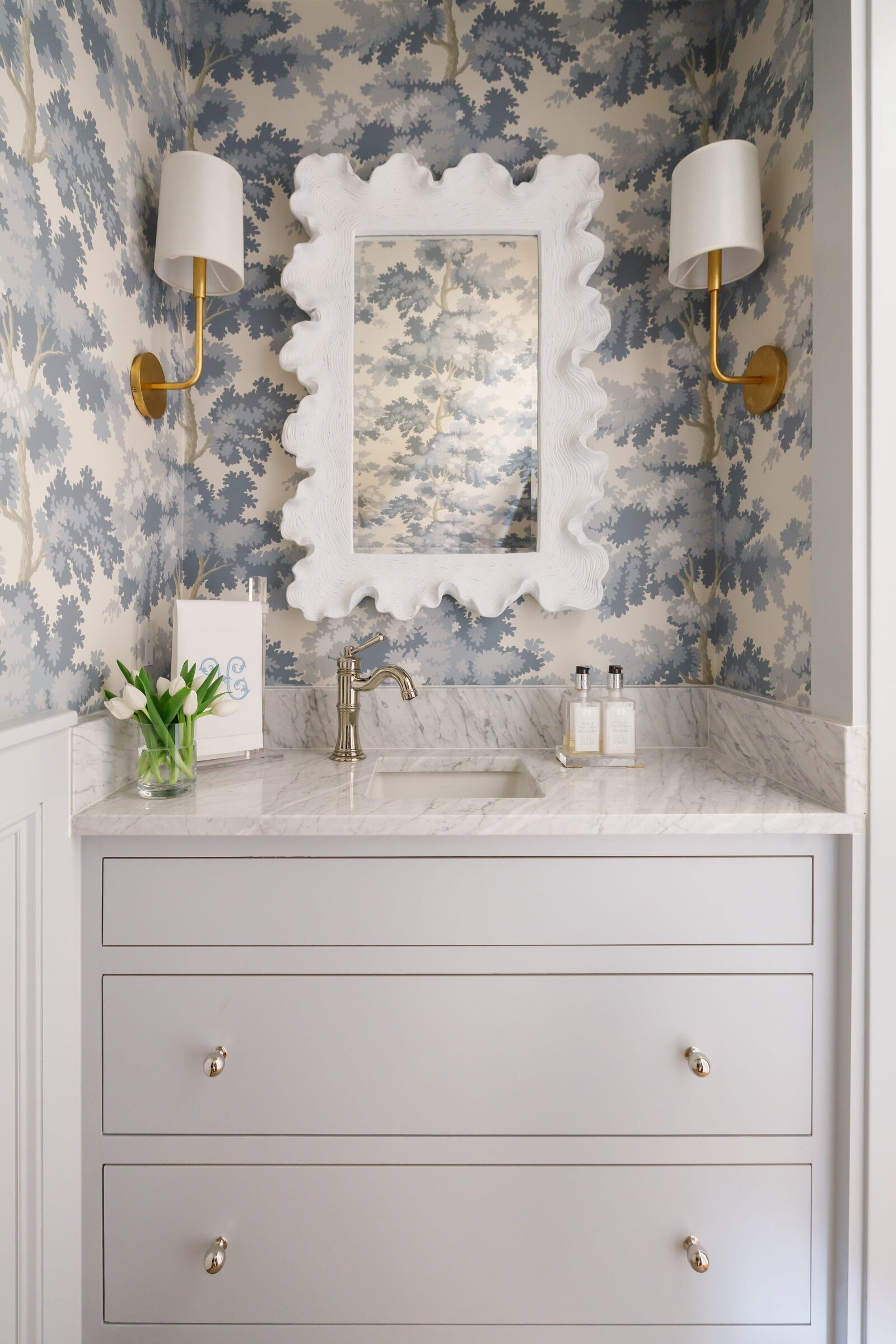 vision and hammer bathroom with blue floral wallpaper