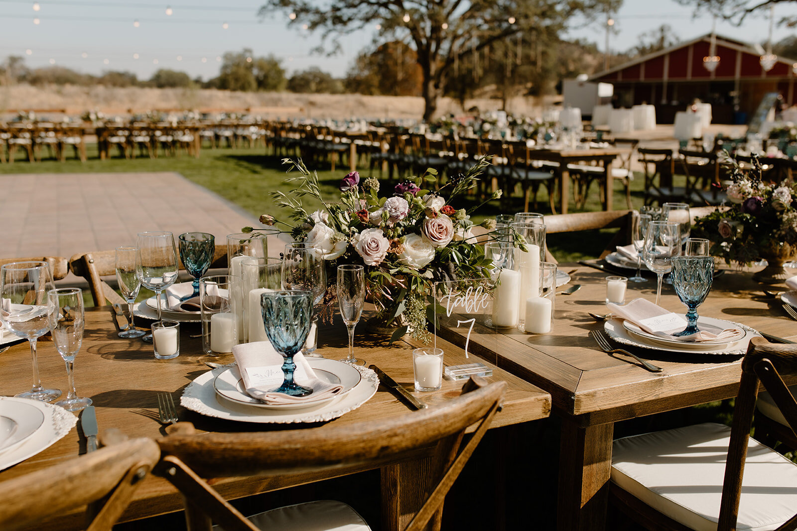 outdoor-wedding-with-farm-tables