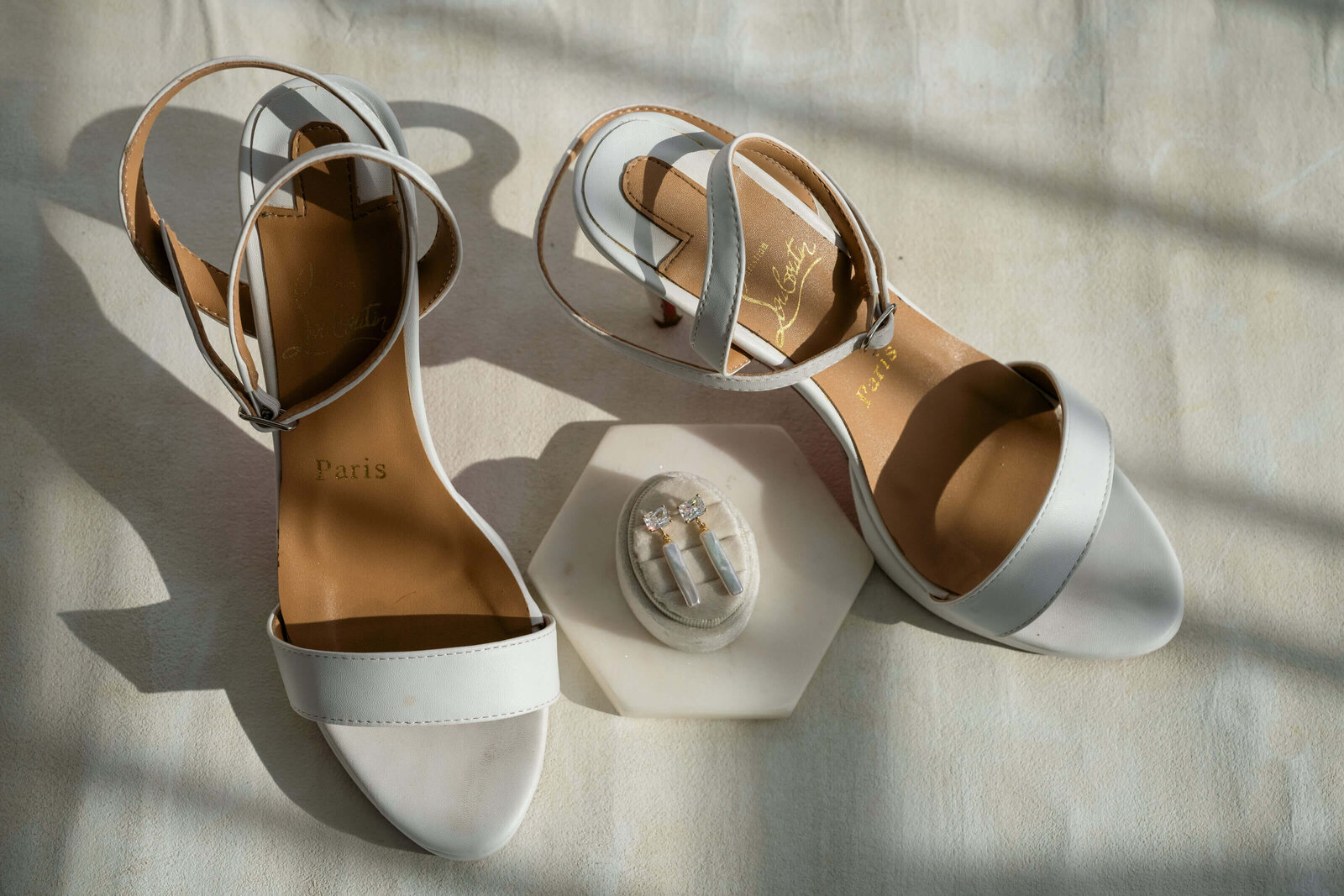 flatlay photo of shoes and a ring box by north georgia wedding photographer