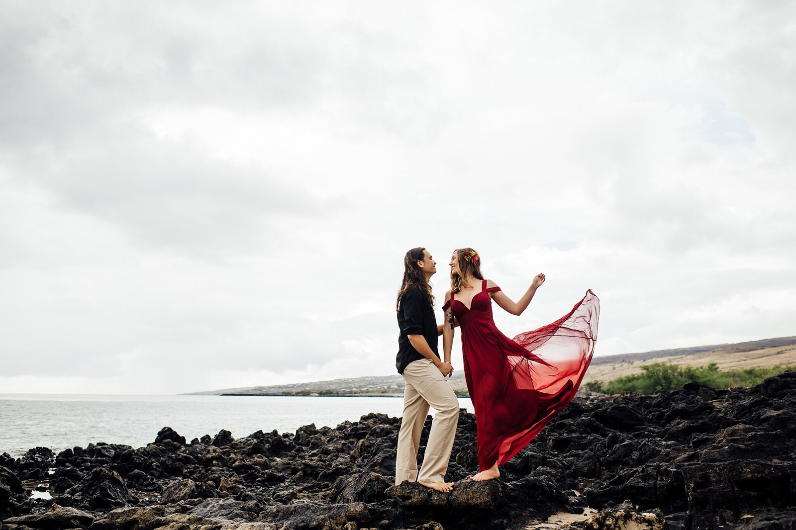 couples on the lava rocks