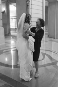 mother of groom and bride at san francisco city hall wedding