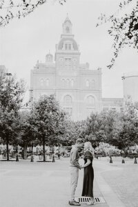 Beautiful wide photo of couple infront of Hotel Emma at the Pearl in San Antonio