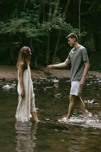 Romantic and moody couple moment in nature - nostalgic film-like aesthetic without being film