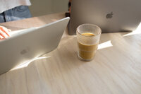 Two laptops and coffee on desk - Marrow Design