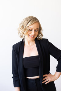 Lis in a black suit