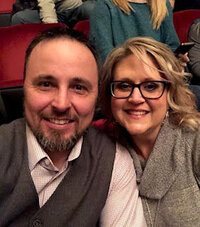 Happy client smiling with her significant other