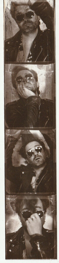 self portraits of Wade Muir in vintage photo booth