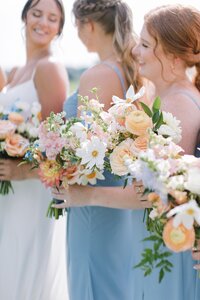 Bridesmaid bouquet detail with peach roses, pink dahlias, and white cosmos by Flowergirl Cville, Charlottesville VA wedding florist | Photo by Paige Ryan Photography
