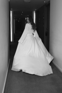 Sophisticated film photography capturing authentic getting ready moments during
Rebecca & Kevin's fashion forward wedding at Miami Beach Edition luxury destination resort.