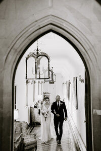 bride and father walking to cermemony