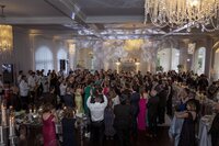 Guests enjoy the dance floor during wedding at Belle Mer Newport.