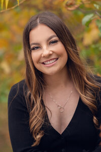 A student from Waukesha South High School has a classic senior picture taken down in Milwaukee's Third Ward.