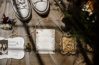 a flat lay detail shot with artistic lighting and converse captured by shelly voss