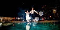 Pool jump wedding photographer