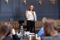 Jill Wright presenting practical strategies for planning, prioritization, and workload management during a workplace workshop.