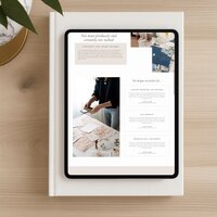 "Elevated Enclosure stationery designer website template displayed on tablet with styled flat lay details"