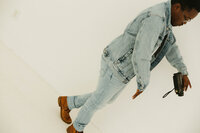 Kendrick walking in denim, Atlanta wedding photographer at work