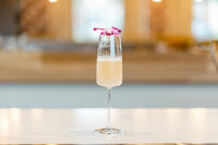 Close up photo of a beautiful drink from Sip and Savor for their branding session.