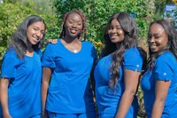 female african american nursing students smiling