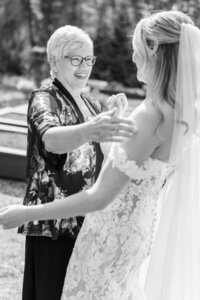 Bride sharing a heartfelt moment with a loved one during wedding photography Detroit MI
