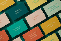 Everything’s Albright brand phrases printed on colorful cards